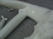 Male, white, reclining, piece no. 2. Partial.