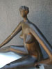 Female, black, seated, piece no. 3, partial
